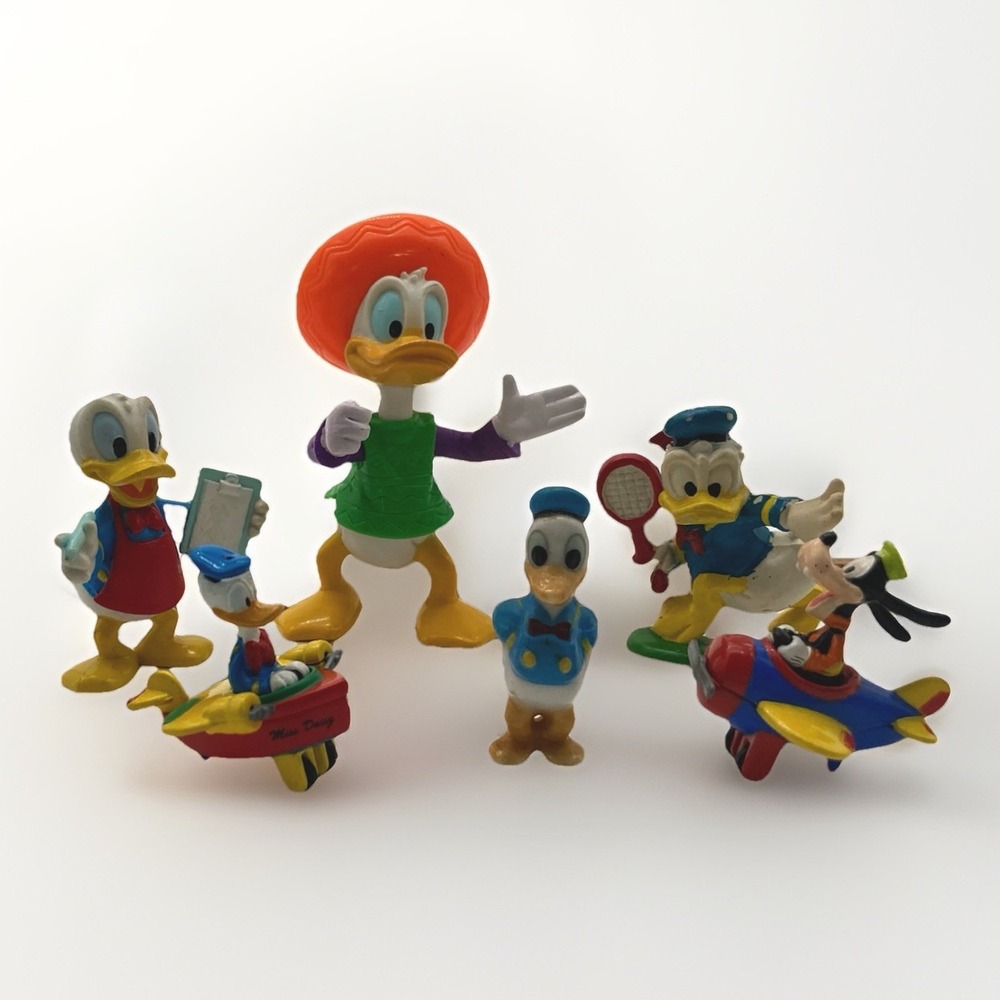 Vintage Donald Duck Miniature Figurines Lot of Seven Mixed Media Collectors Item